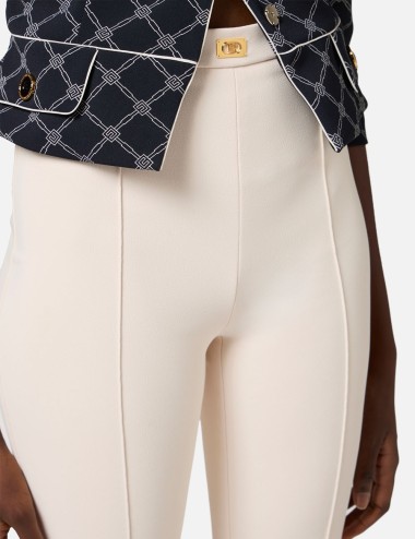 Crêpe bell-bottom trousers with logo plaque Butter