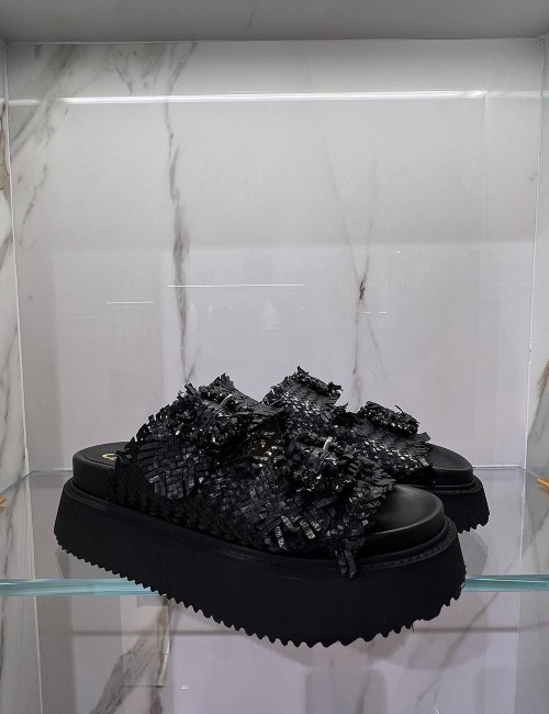 Sandali piattaforma in pelle intrecciata nera