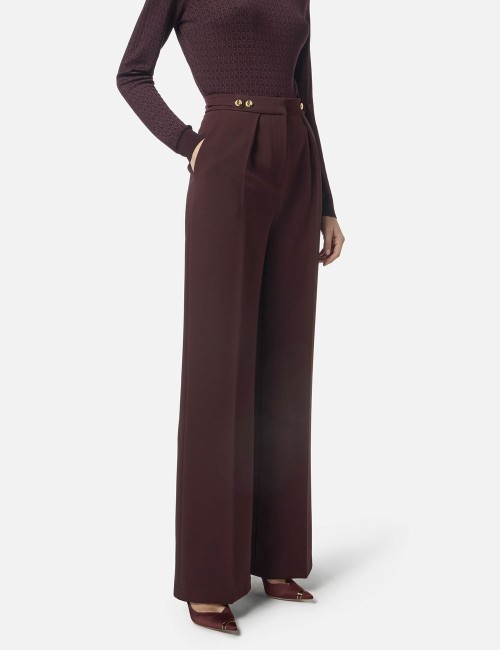 Pantaloni in crêpe con accessorio gioiello merlot