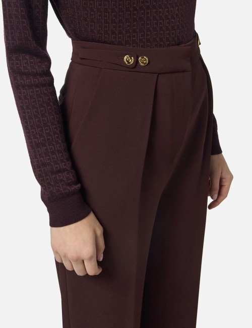 Trousers in crêpe fabric with jewel accessory merlot