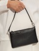 Pochette da polso convertibile Jet Set media in pelle martellata nera