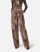 Trousers in lightweight jersey fabric with alligator print cocoa