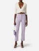 Trousers in lightweight crêpe fabric with logo charm lillà