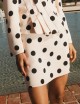 Mini gonna in satin pois cipria