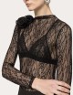 Body in pizzo con dettagli floreali nero