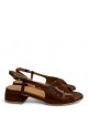Sandalo slingback in vernice a fasce incrociate cuoio