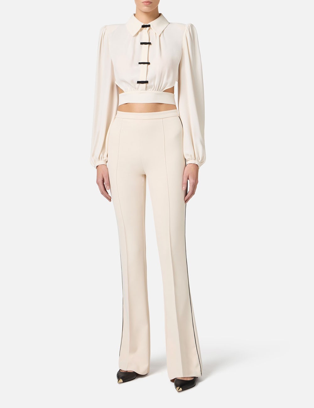 Pantaloni in crêpe con piping a contrasto burro nero