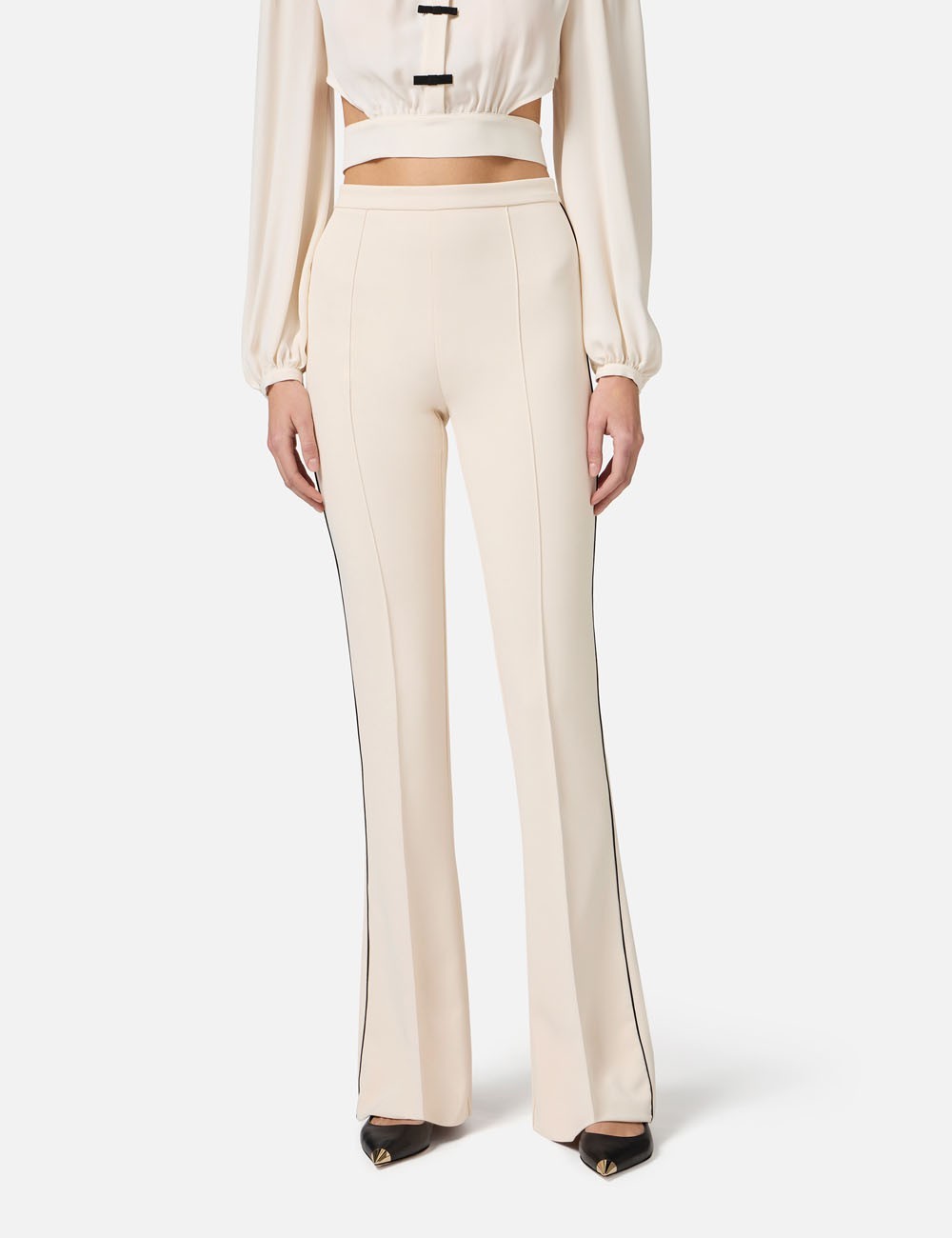 Pantaloni in crêpe con piping a contrasto burro nero