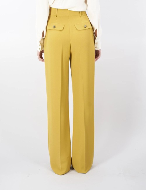 Flowing crêpe trousers with golden buttons curry