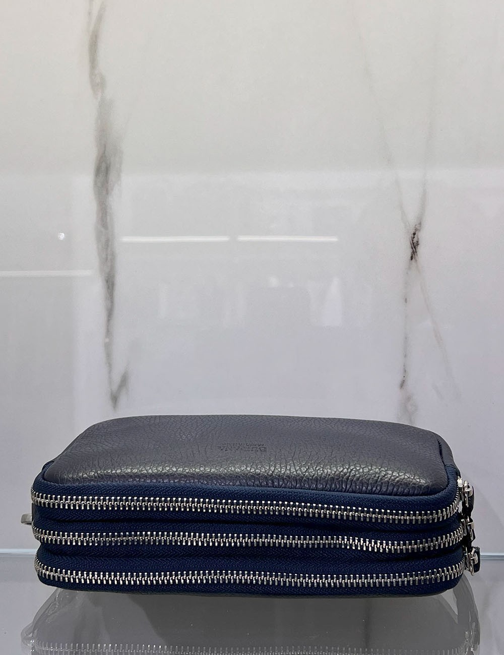 Pochette in pelle con 3 scomparti blu