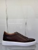 Sneakers in pelle traforate testa di moro