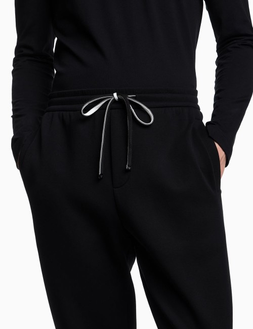 Double-jersey joggers with eagle logo patch black